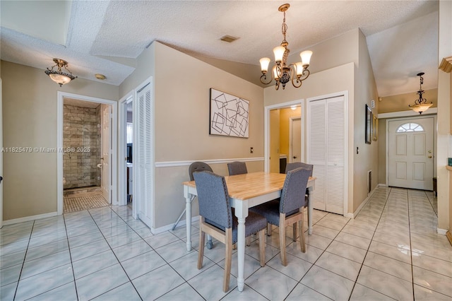 1381 SW Leisure Ln, Port St Lucie, FL 34953 - dining area with a chandelier, light tile patterned flooring, and a textured ceiling