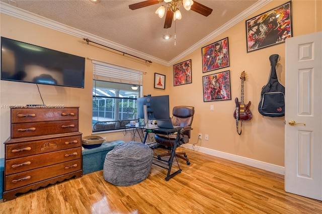 1381 SW Leisure Ln, Port St Lucie, FL 34953 - office area featuring ornamental molding, a textured ceiling, wood finished floors, ceiling fan, and vaulted ceiling