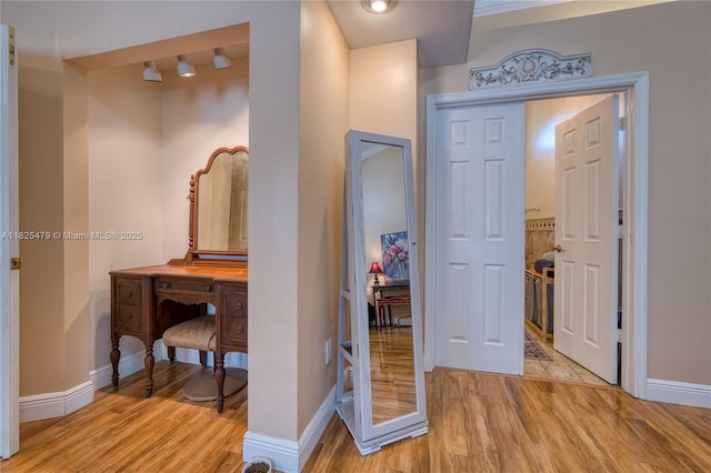 1381 SW Leisure Ln, Port St Lucie, FL 34953 - corridor with light wood-style floors