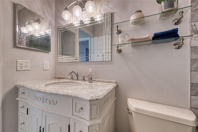 1381 SW Leisure Ln, Port St Lucie, FL 34953 - bathroom with a chandelier and vanity