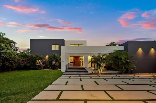 7660 SW 124th St, Pinecrest, FL 33156 - view of front of house with stucco siding and a front yard