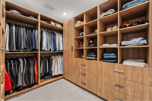 7660 SW 124th St, Pinecrest, FL 33156 - spacious closet featuring light tile patterned floors