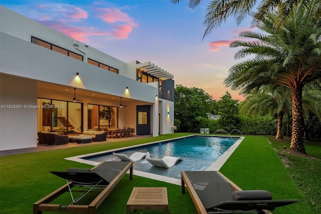 7660 SW 124th St, Pinecrest, FL 33156 - swimming pool featuring an outdoor living space, a lawn, a patio area, and a ceiling fan