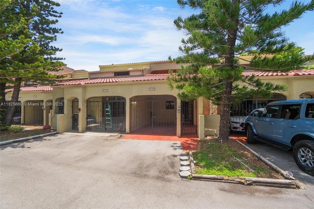 3538 Estepona Ave Unit D-2, Doral, FL 33178 - mediterranean / spanish house featuring stucco siding and a tiled roof