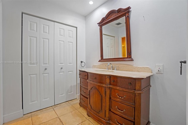3538 Estepona Ave Unit D-2, Doral, FL 33178 - bathroom featuring a closet, vanity, and recessed lighting