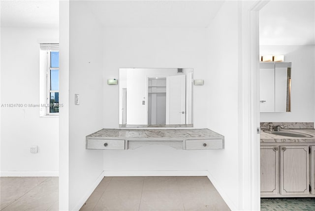 3551 NE 169th St Unit 312, North Miami Beach, FL 33160 - hall featuring a sink and tile patterned floors