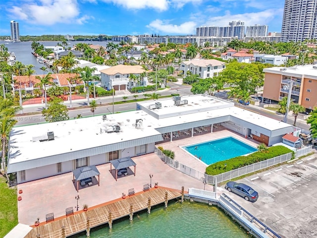 3551 NE 169th St Unit 312, North Miami Beach, FL 33160 - bird's eye view of a pool area and a nearby body of water