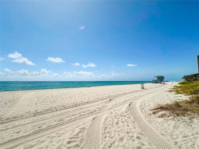 6767 Collins Ave Unit 704, Miami Beach, FL 33141 - water view featuring local beach