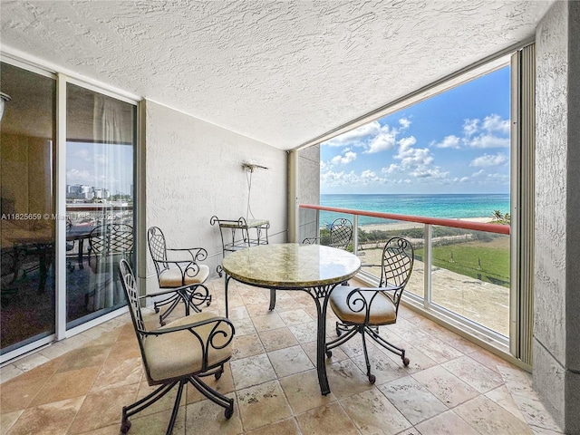 6767 Collins Ave Unit 704, Miami Beach, FL 33141 - balcony with view of water and beach