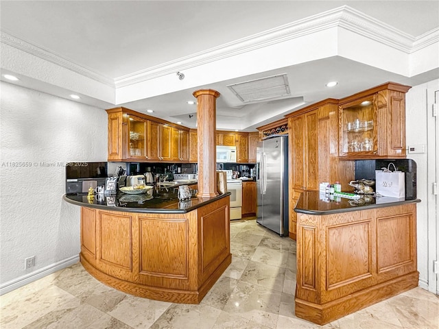 6767 Collins Ave Unit 704, Miami Beach, FL 33141 - kitchen with white appliances, a peninsula, glass insert cabinets, dark countertops, and ornamental molding
