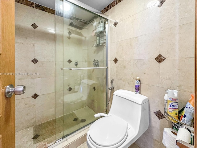 6767 Collins Ave Unit 704, Miami Beach, FL 33141 - full bathroom featuring tile walls and a shower stall