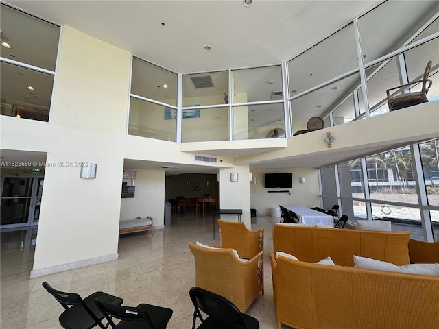 6767 Collins Ave Unit 704, Miami Beach, FL 33141 - building lobby with a high ceiling