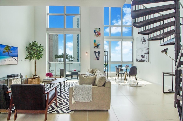 300 S Biscayne Blvd Unit L-1228, Miami, FL 33131 - tiled living area featuring a towering ceiling