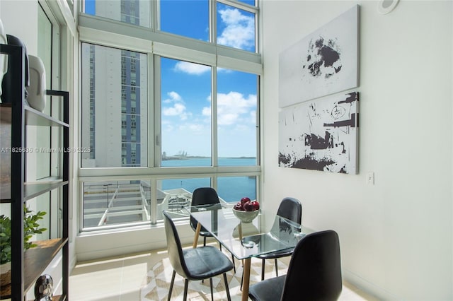 300 S Biscayne Blvd Unit L-1228, Miami, FL 33131 - dining space featuring a water view