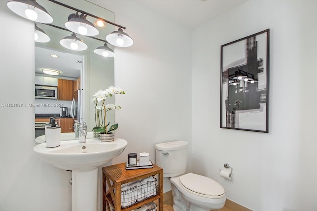300 S Biscayne Blvd Unit L-1228, Miami, FL 33131 - bathroom with toilet and baseboards