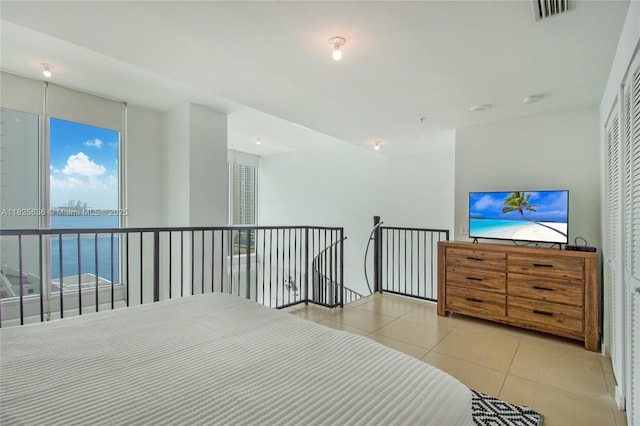 300 S Biscayne Blvd Unit L-1228, Miami, FL 33131 - bedroom with a water view and tile patterned flooring