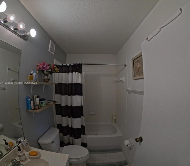 985 NE 34th Ave Unit 203, Homestead, FL 33033 - full bath with shower / bathtub combination with curtain, a textured ceiling, and vanity