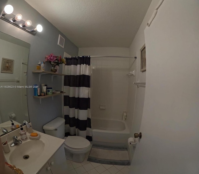 985 NE 34th Ave Unit 203, Homestead, FL 33033 - bathroom with tile patterned floors, vanity, shower / tub combo, and a textured ceiling