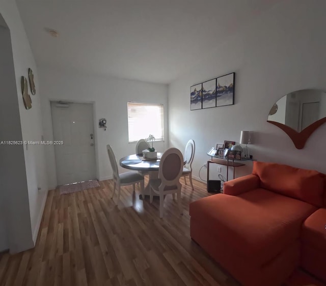 985 NE 34th Ave Unit 203, Homestead, FL 33033 - dining room featuring wood finished floors and baseboards