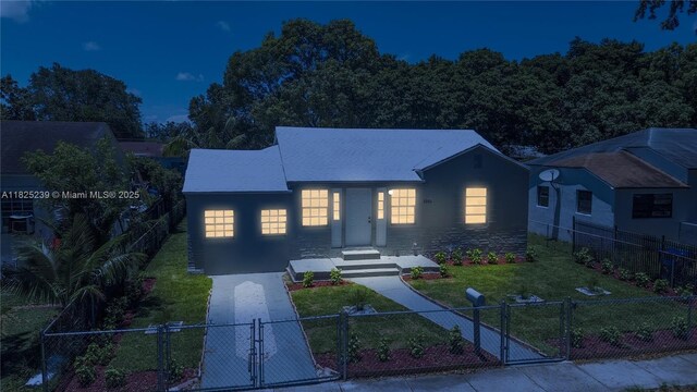 1051 NW 63rd St, Miami, FL 33150 - view of front of property with a gate and a fenced front yard