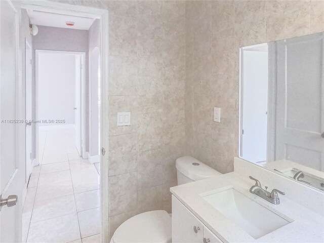 1051 NW 63rd St, Miami, FL 33150 - bathroom featuring tile patterned flooring and vanity