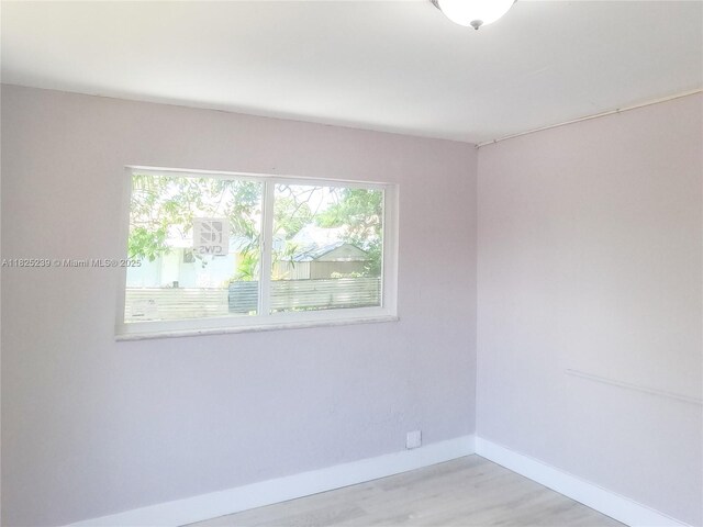 1051 NW 63rd St, Miami, FL 33150 - spare room featuring light wood-style floors and baseboards