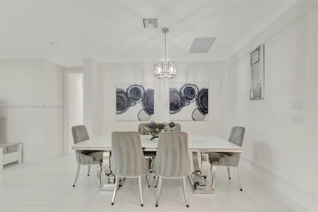 13307 SW Green Delta Rd, Port St Lucie, FL 34987 - dining space featuring a chandelier and light tile patterned floors