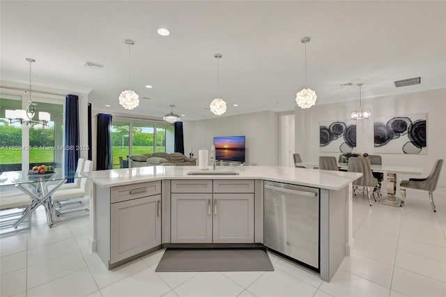 13307 SW Green Delta Rd, Port St Lucie, FL 34987 - kitchen with dishwasher, a chandelier, open floor plan, light countertops, and recessed lighting