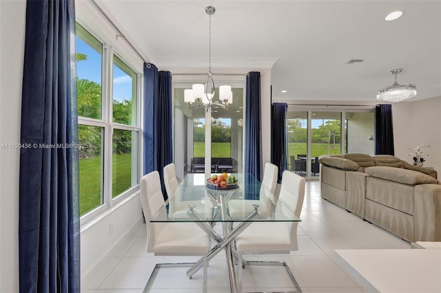 13307 SW Green Delta Rd, Port St Lucie, FL 34987 - dining space featuring a chandelier, plenty of natural light, light tile patterned floors, and recessed lighting