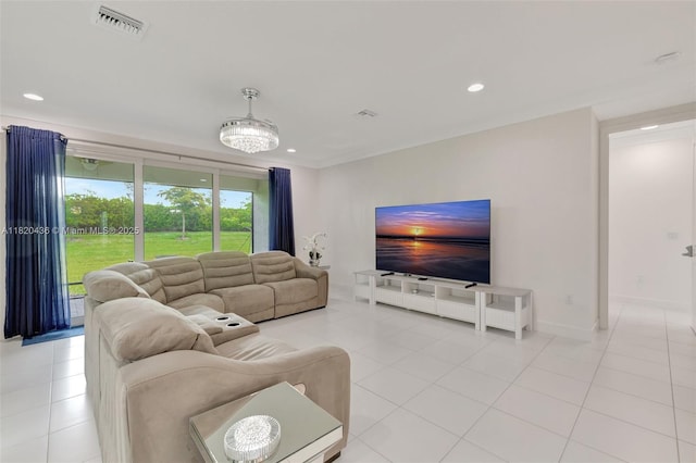 13307 SW Green Delta Rd, Port St Lucie, FL 34987 - living area featuring light tile patterned flooring and recessed lighting