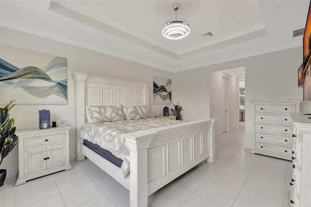 13307 SW Green Delta Rd, Port St Lucie, FL 34987 - bedroom featuring a raised ceiling and light tile patterned flooring