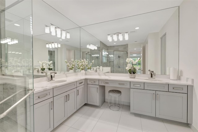 13307 SW Green Delta Rd, Port St Lucie, FL 34987 - bathroom featuring vanity, a stall shower, and tile patterned flooring