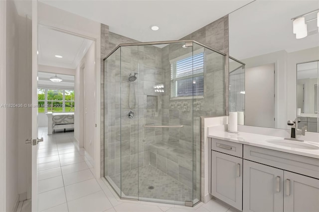 13307 SW Green Delta Rd, Port St Lucie, FL 34987 - full bath with vanity, a stall shower, and tile patterned flooring