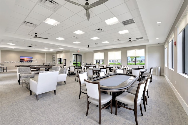 13307 SW Green Delta Rd, Port St Lucie, FL 34987 - dining room featuring light colored carpet, ceiling fan, healthy amount of natural light, and a drop ceiling