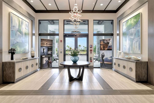 13307 SW Green Delta Rd, Port St Lucie, FL 34987 - foyer entrance featuring a chandelier and recessed lighting