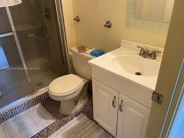 1351 NE Miami Gardens Dr Unit 1014E, Miami, FL 33179 - full bath featuring vanity and a shower stall