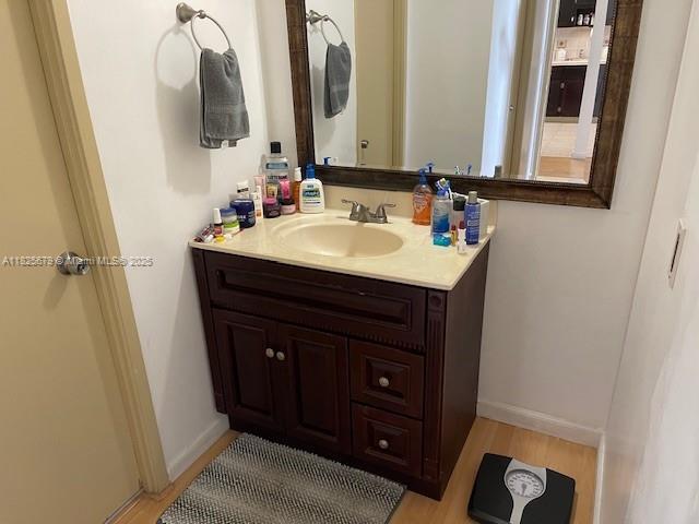 1351 NE Miami Gardens Dr Unit 1014E, Miami, FL 33179 - bathroom featuring vanity and wood finished floors