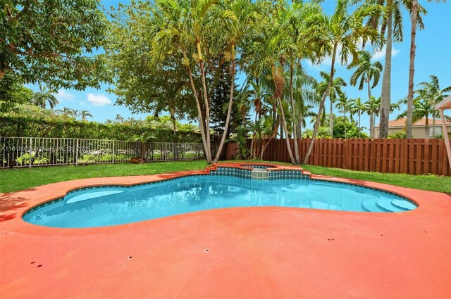 4333 SW 84th Ter, Davie, FL 33328 - view of swimming pool with a fenced backyard, a patio area, and a pool with connected hot tub