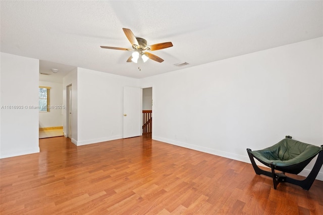 4333 SW 84th Ter, Davie, FL 33328 - empty room with a ceiling fan and light wood-style floors