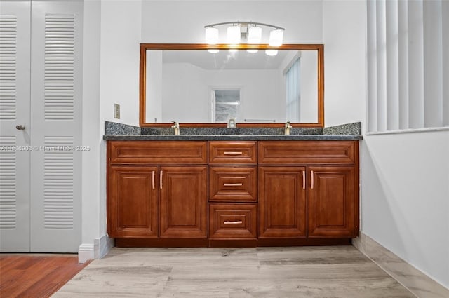 4333 SW 84th Ter, Davie, FL 33328 - bathroom with vanity and wood finished floors