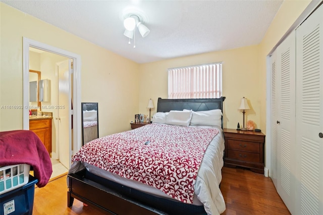 4333 SW 84th Ter, Davie, FL 33328 - bedroom with a closet, wood finished floors, and connected bathroom