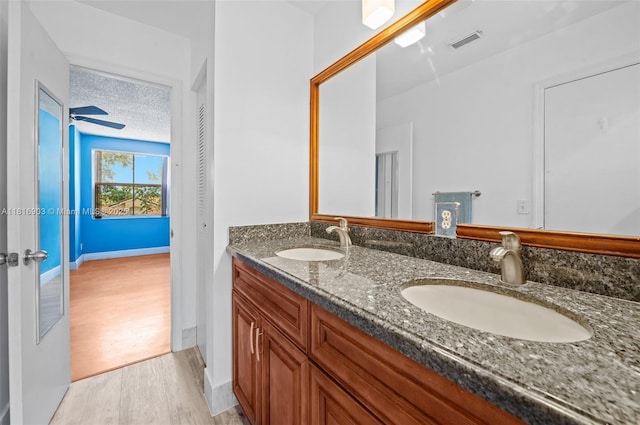 4333 SW 84th Ter, Davie, FL 33328 - bathroom with wood finished floors and double vanity
