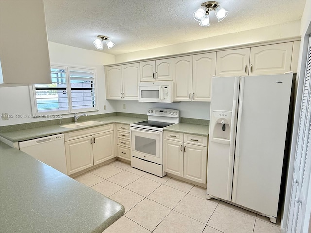 1143 NW 122nd Ter, Pembroke Pines, FL 33026 - kitchen with white appliances, light tile patterned floors, a textured ceiling, and light countertops