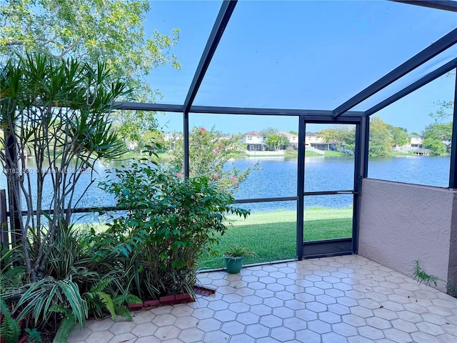 1143 NW 122nd Ter, Pembroke Pines, FL 33026 - unfurnished sunroom featuring a water view