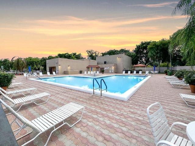 1143 NW 122nd Ter, Pembroke Pines, FL 33026 - community pool with a patio