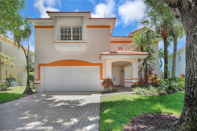 676 NW 133rd Dr, Plantation, FL 33325 - mediterranean / spanish-style home with a garage, stucco siding, a tiled roof, and decorative driveway