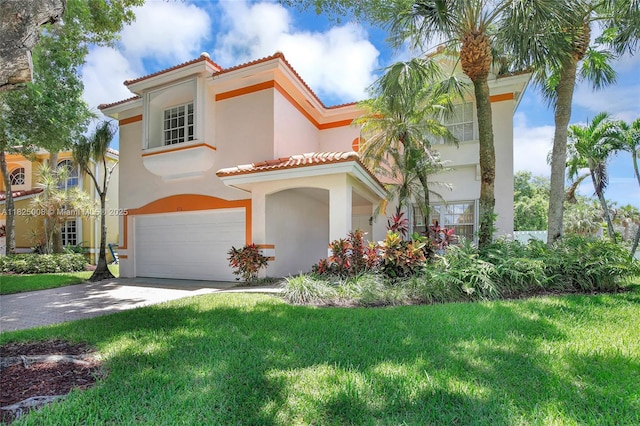 676 NW 133rd Dr, Plantation, FL 33325 - mediterranean / spanish-style home featuring a tile roof, an attached garage, stucco siding, concrete driveway, and a front lawn