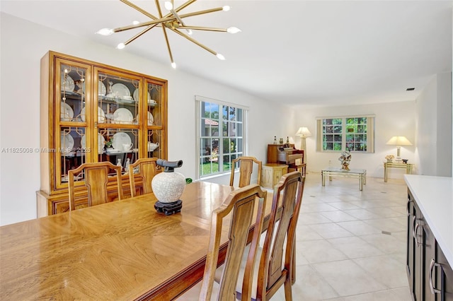 676 NW 133rd Dr, Plantation, FL 33325 - dining room with a chandelier, plenty of natural light, and light tile patterned floors