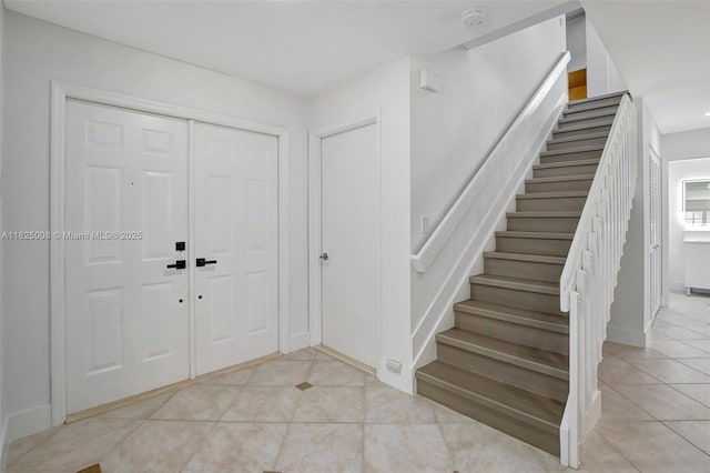 676 NW 133rd Dr, Plantation, FL 33325 - foyer entrance featuring light tile patterned flooring and stairs