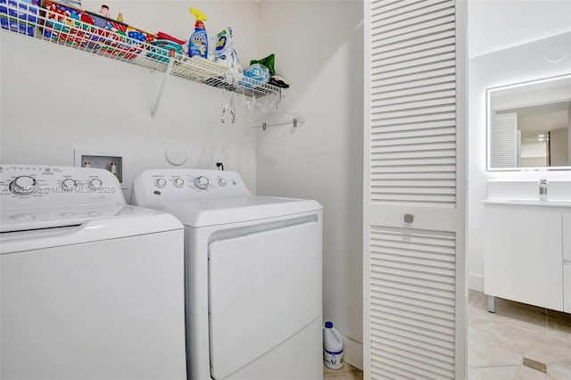 676 NW 133rd Dr, Plantation, FL 33325 - laundry area with separate washer and dryer and light tile patterned floors